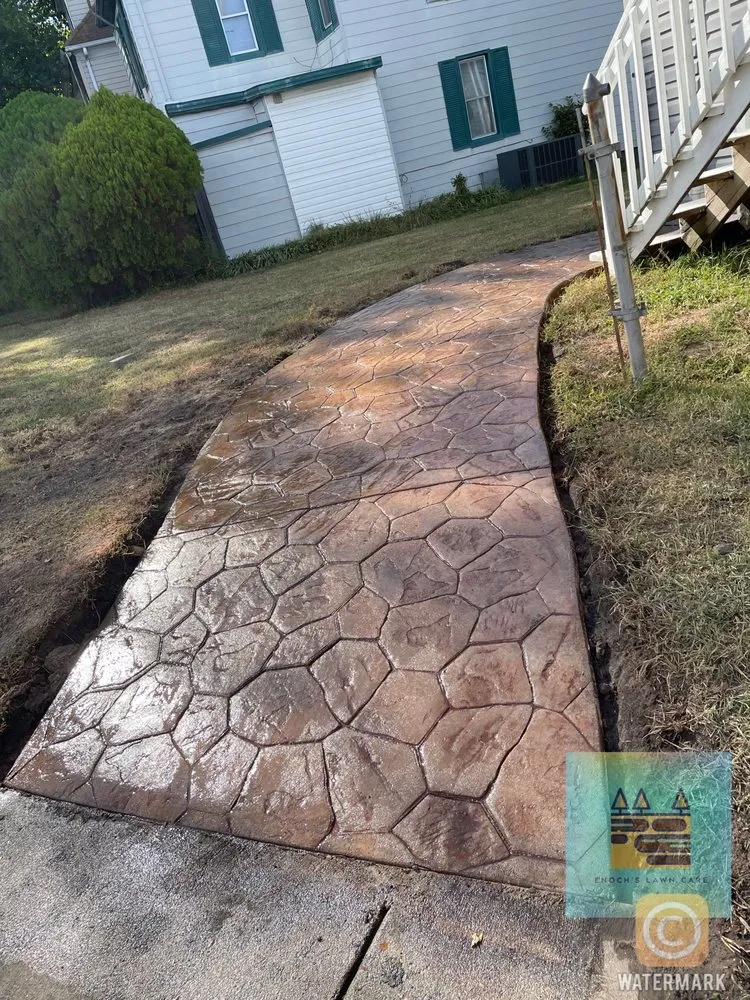 Expert lawn care service for residential properties across Suffolk, VA - Enochs Lawncare Trees Concrete and Home Renovation Contractors