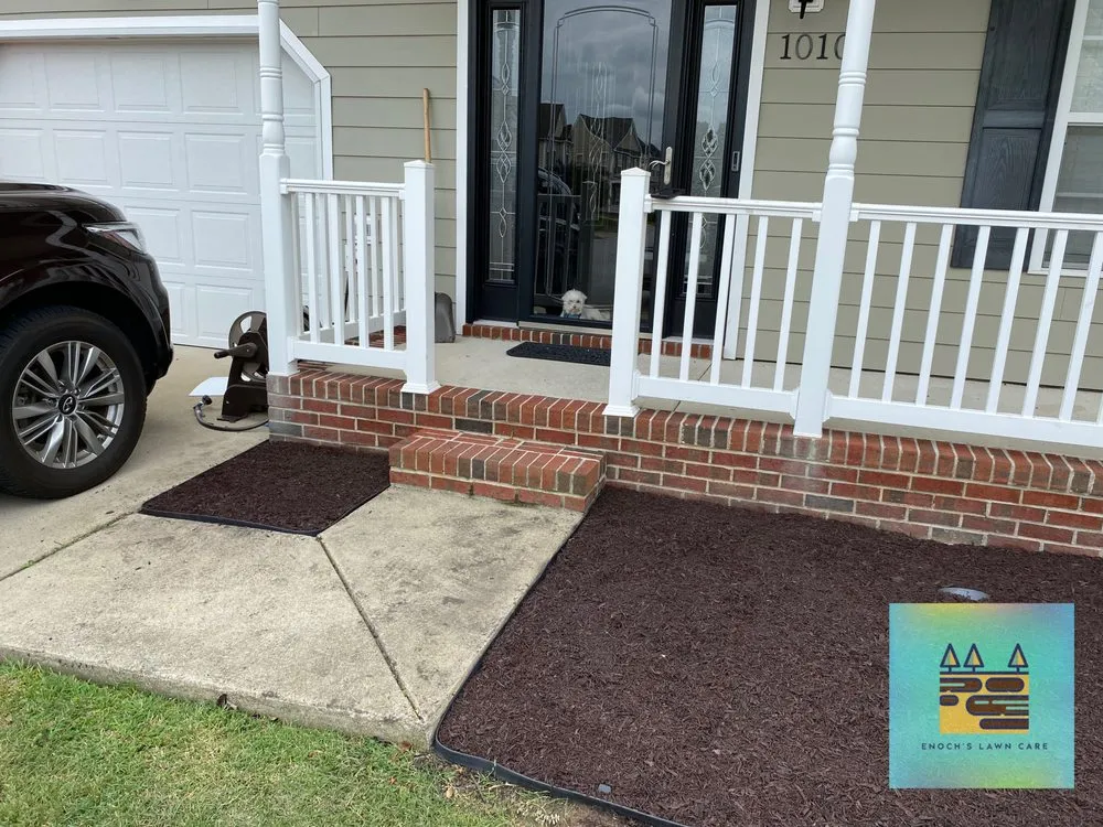 Custom landscape installation in Suffolk, VA by Enochs Lawncare Trees Concrete and Home Renovation Contractors