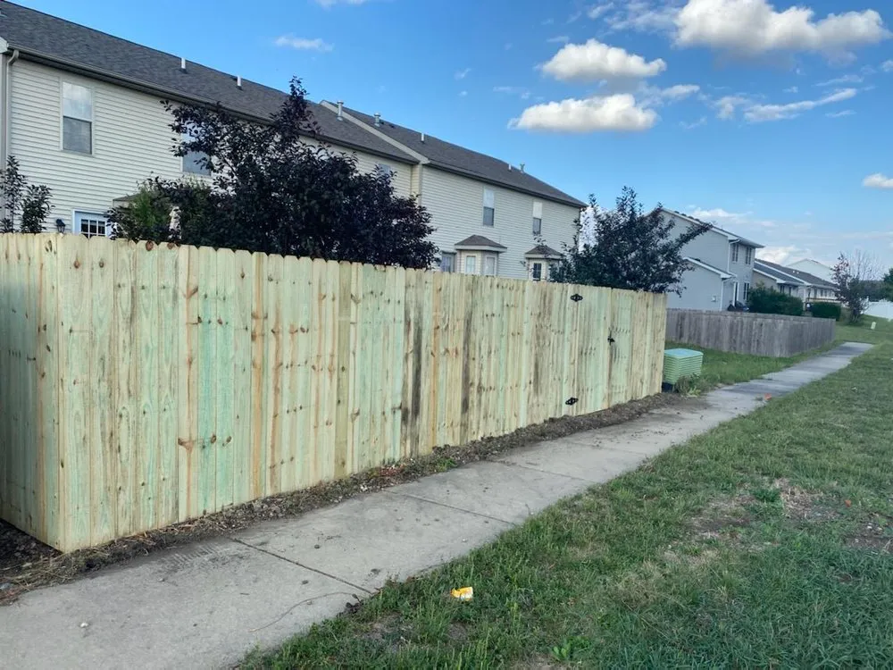 Affordable yard maintenance in Champaign, IL by Enriquez C-U Services