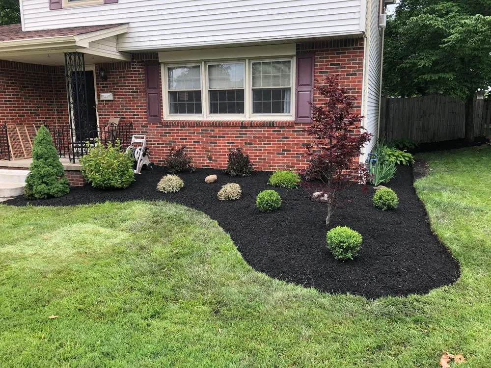 Professional outdoor landscaping with custom design in Hamburg, NY by Enser’s Lawn & Landscaping