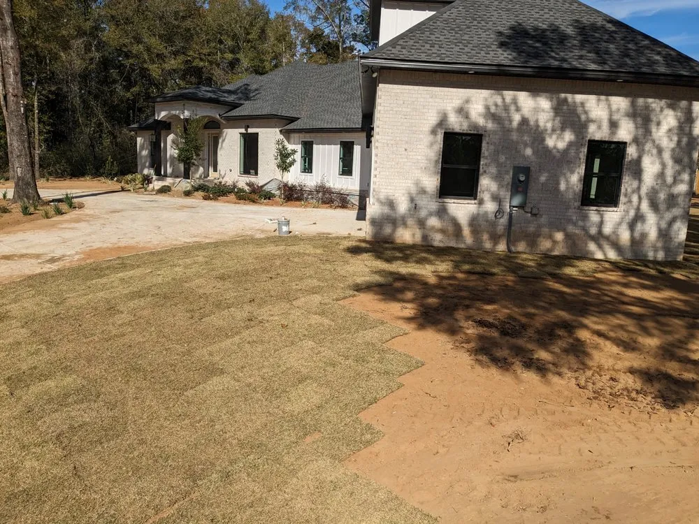 Reliable yard cleanup service for residential properties in Jay, FL by Ensley Landscaping