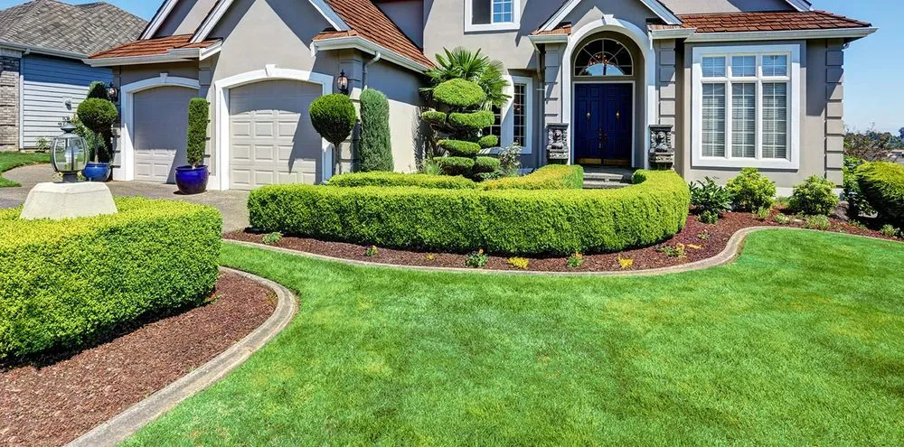 Professional lawn care service for homes in Wood Dale, IL by Enviro Lawn Services