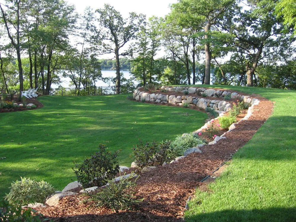 Expert yard cleanup service in Burnsville, MN by Environmental Design