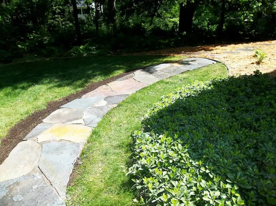 Top-rated lawn mowing service with custom design in Hudson, WI by Environmental Landscape Management