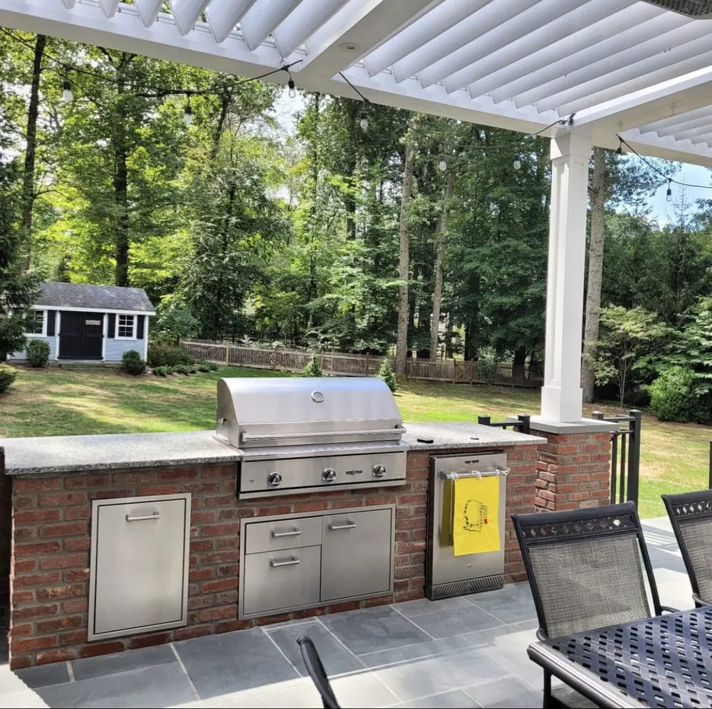 Affordable lawn mowing service for year-round maintenance in Cedar Park, TX by Envision Designs