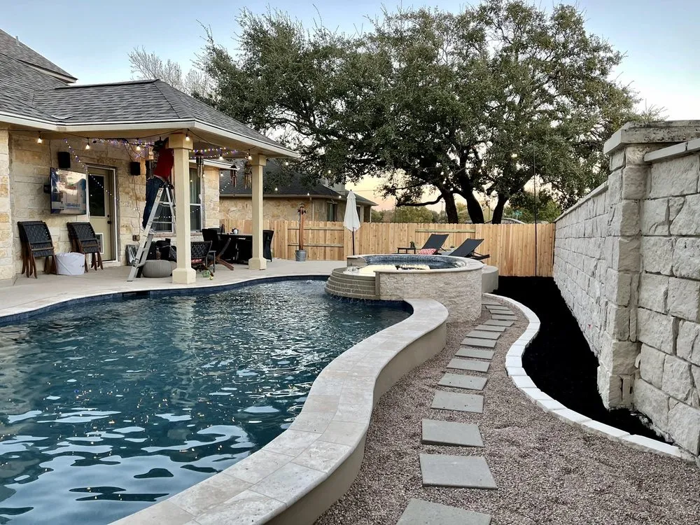 Professional yard cleanup service in Round Rock, TX by Envision Landscapes & Tree Service