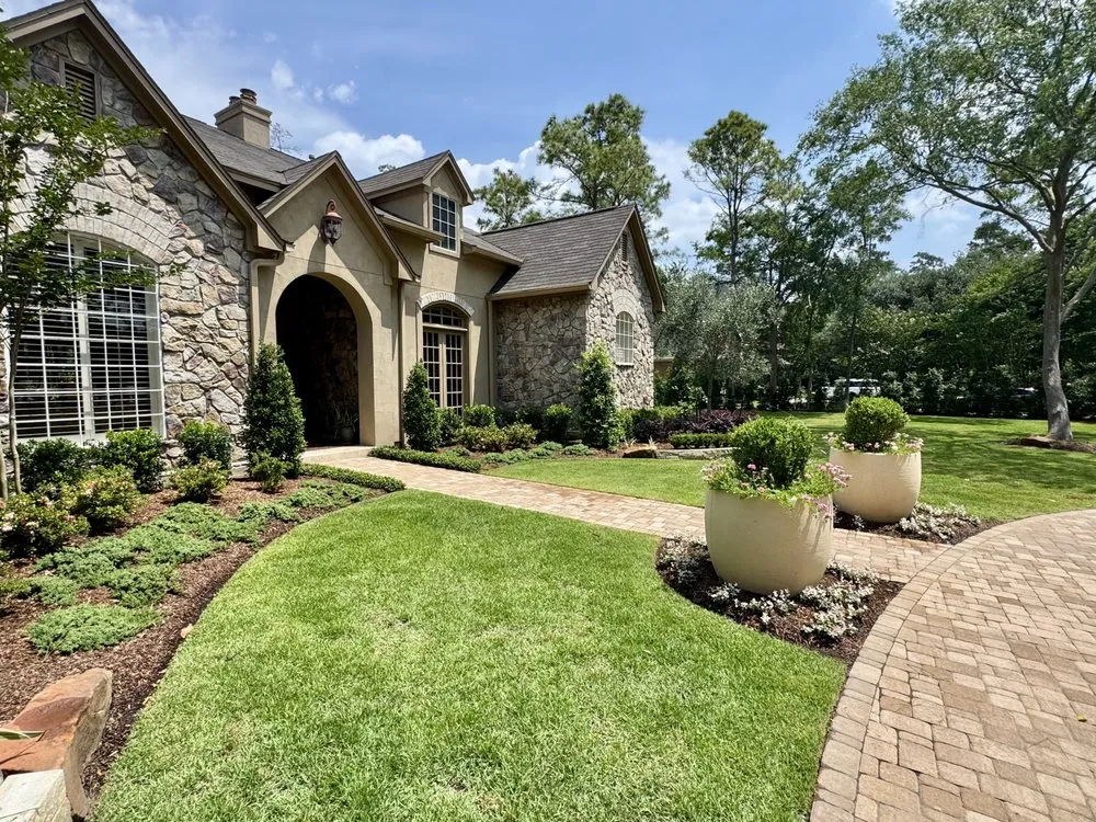 Local lawn mowing service in Tomball, TX by Envy Exteriors