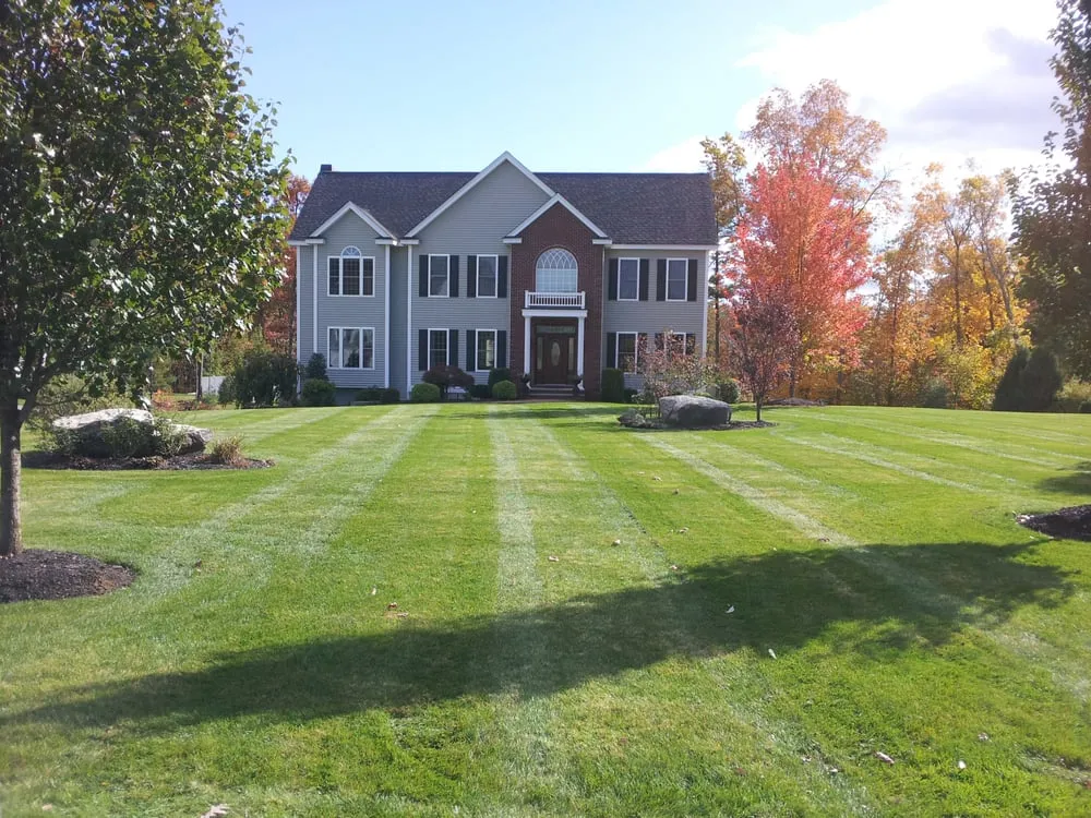 Professional yard cleanup service for residential properties across Hampstead, NH - Erhardt and Shallow Landscaping