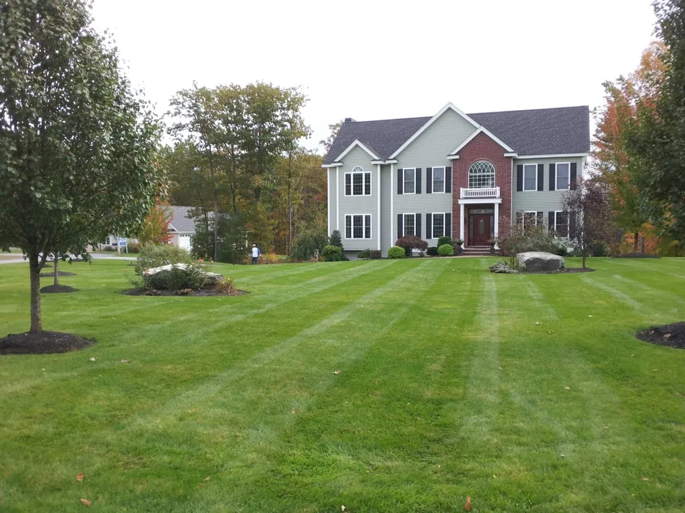 Affordable outdoor landscaping with custom design in Hampstead, NH by Erhardt and Shallow Landscaping