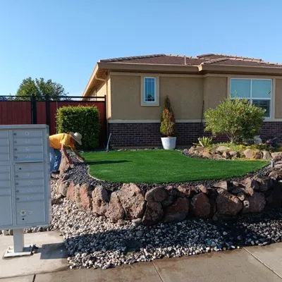 Erick Handyman & Landscape Services Logo