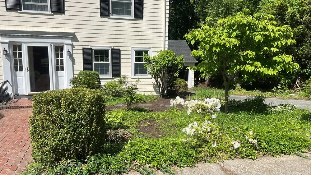 Custom landscaping services for residential properties in Waltham, MA by Erick Landscaping