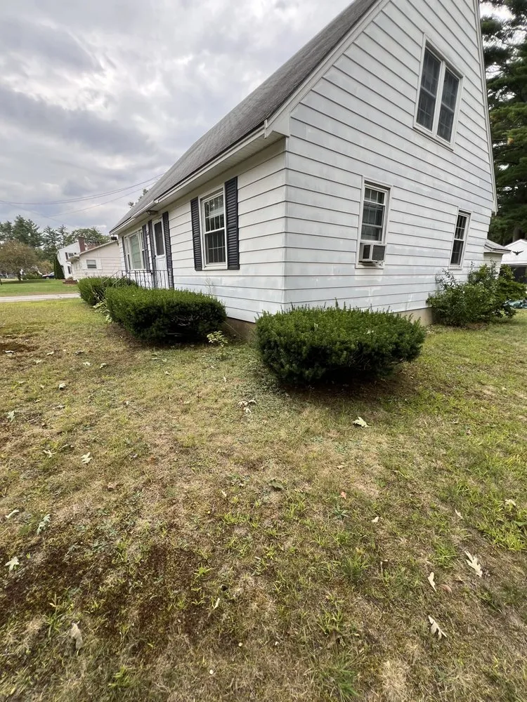 Custom lawn care service for residential properties in Rochester, NH by Ericks Lawn Care