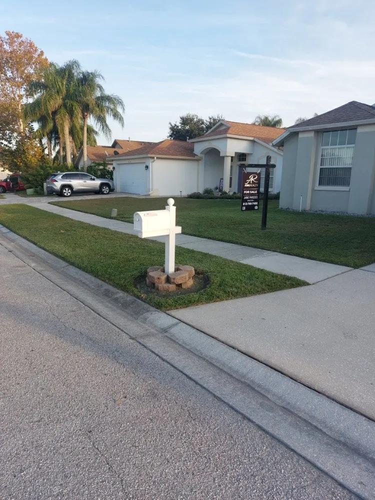 Trusted lawn mowing service for homes in Land O Lakes, FL by Eric's Handyman Services