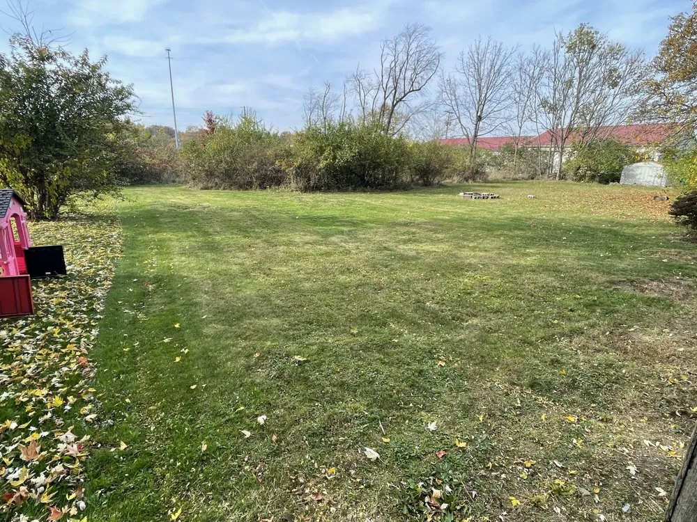 Affordable lawn mowing service for residential properties in Canton, OH by Eric's Lawn and Landscaping