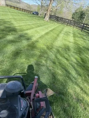 Erics lawn and landscaping Logo