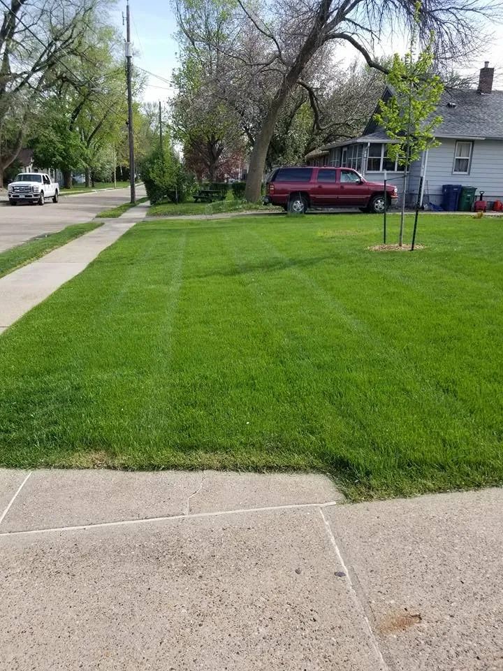 Top-rated outdoor landscaping with custom design in Urbandale, IA by Eric's Mow N Guy
