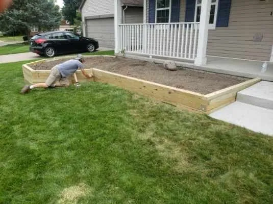 Top-rated landscape installation with custom design in Fenton, MI by Eric's Restoration & Renovation