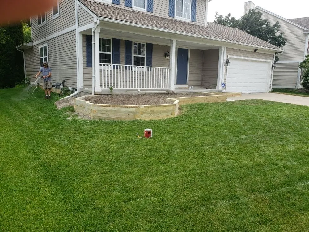 Affordable lawn mowing service in Fenton, MI by Eric's Restoration & Renovation