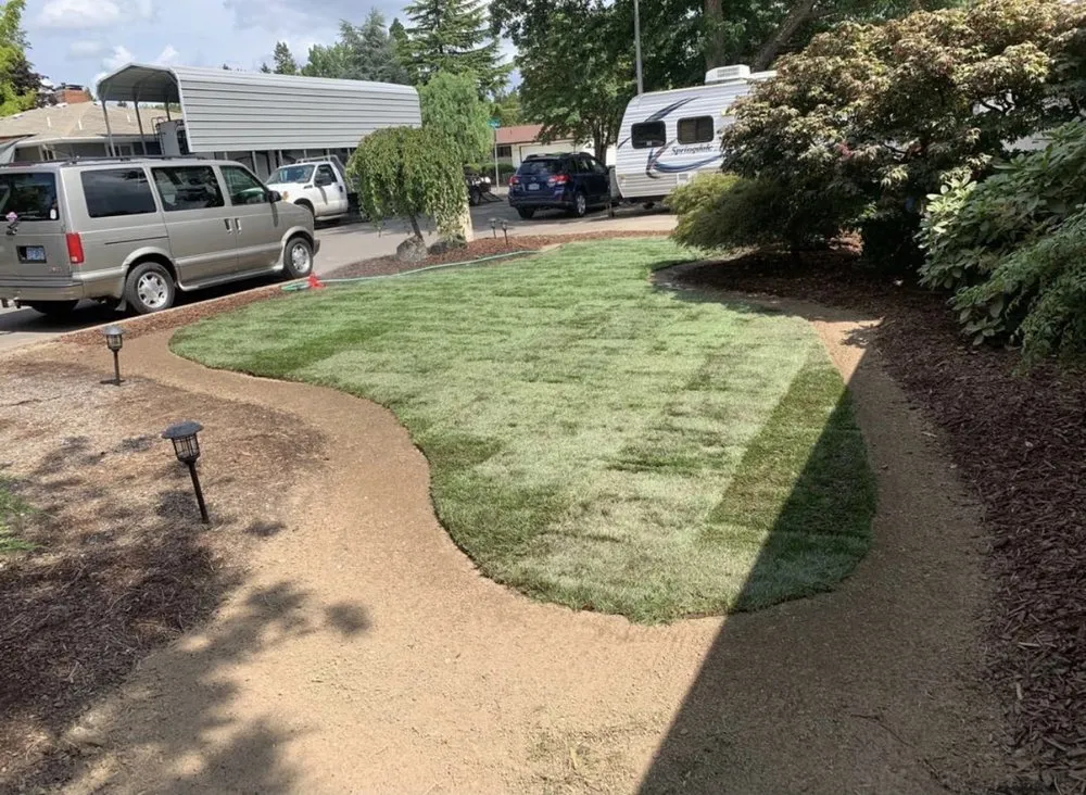 Affordable lawn mowing service for residential properties in Hillsboro, OR by Ernest Landscape