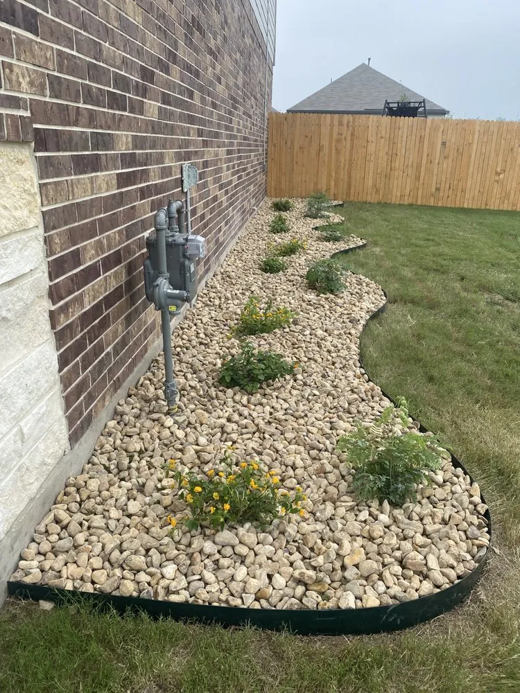 Affordable yard cleanup service for year-round maintenance in Cibolo, TX by Ernest Lawn Mowing Service