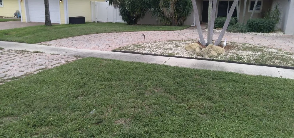 Top-rated lawn mowing service for year-round maintenance in Pompano Beach, FL by Ernest Property Maintenance Lawn and Landscape