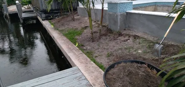 Ernest Property Maintenance Lawn and Landscape Logo