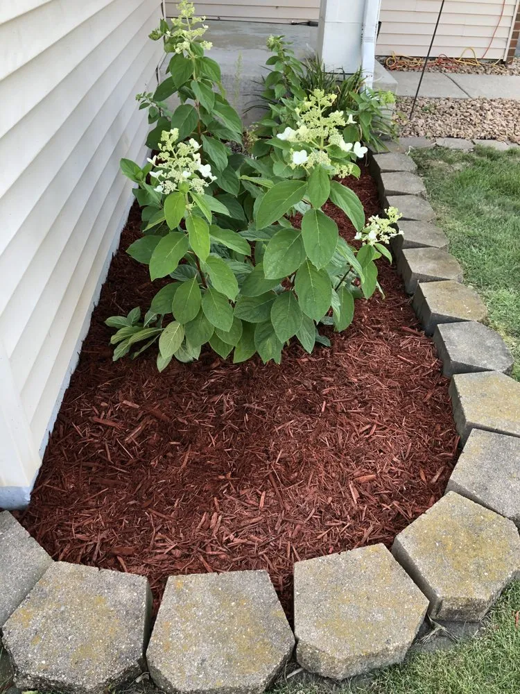 Custom garden landscaping for beautiful yards in Apple Valley, MN by E’S Outdoor Services