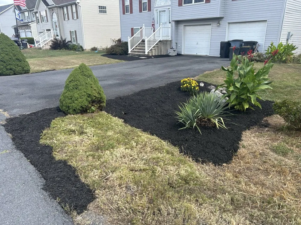 Custom yard cleanup service for residential properties in Martinsburg, WV by ESG Lawncare