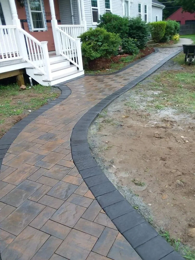 Expert lawn mowing service for outdoor upgrades in Clinton, MA by Espinoza Landscaping