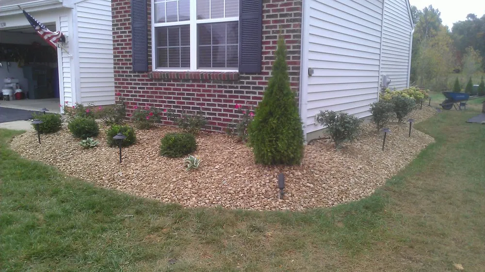Top-rated lawn mowing service with custom design in Columbus, OH by Essential Landscaping Construction