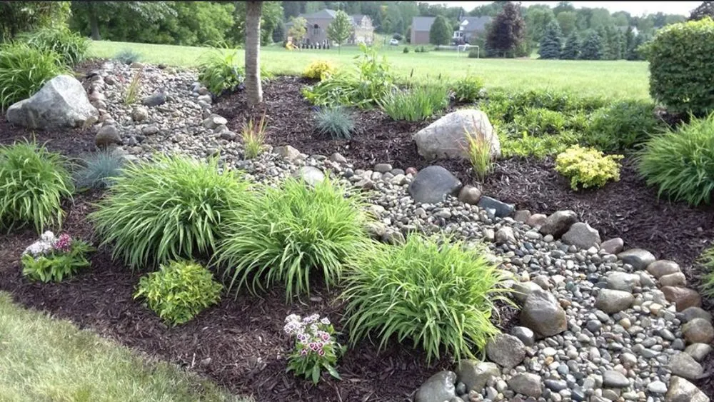 Expert yard maintenance with custom design in Bruce Township, MI by Estate Lawn & Landscape