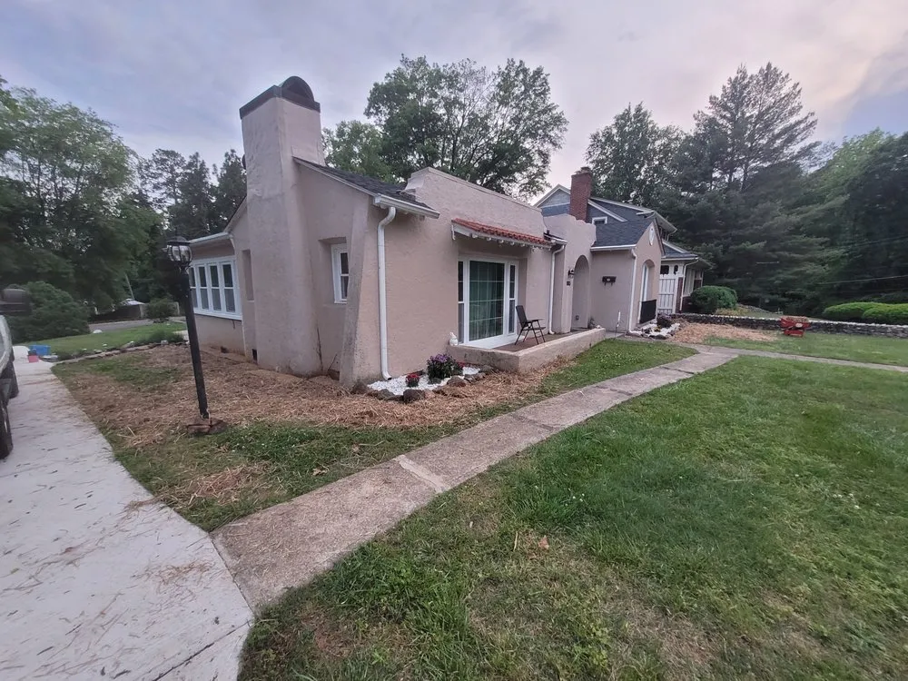 Custom landscape installation for residential properties in Sutherland, VA by Estes Lawn Care Services and More