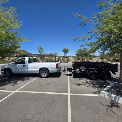 Estrada Hauling And Landscape Logo