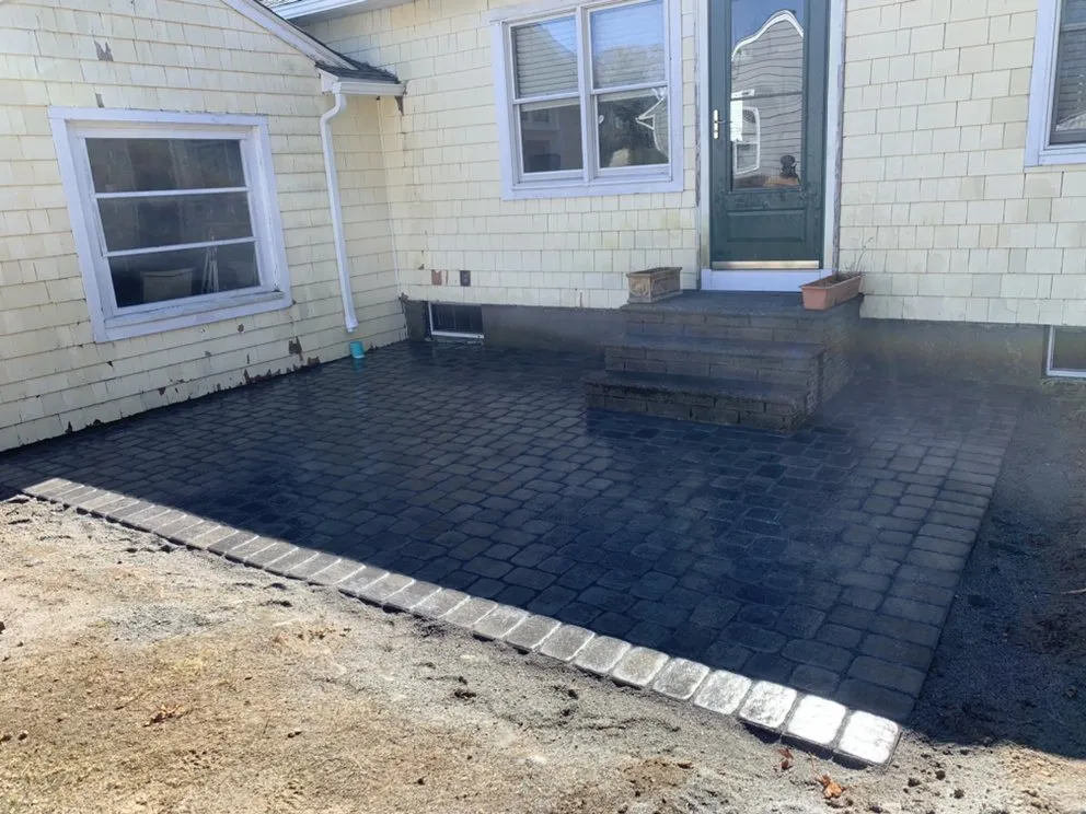 Affordable yard maintenance with custom design in Providence, RI by Estrada Landscaping