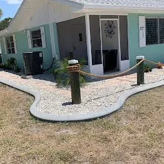 Expert garden landscaping in Port Charlotte, FL by Estrada Lawn Service & Concrete Curbing