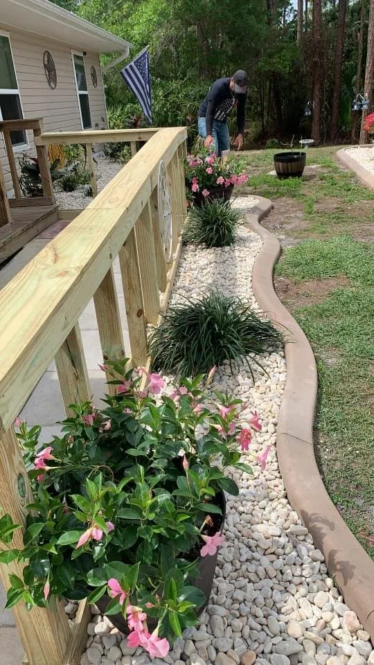 Professional garden landscaping for year-round maintenance in Port Charlotte, FL by Estrada Lawn Service & Concrete Curbing