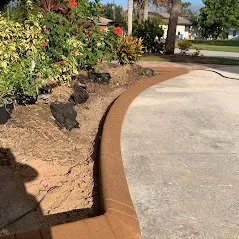 Custom garden landscaping experts serving Port Charlotte, FL - Estrada Lawn Service & Concrete Curbing