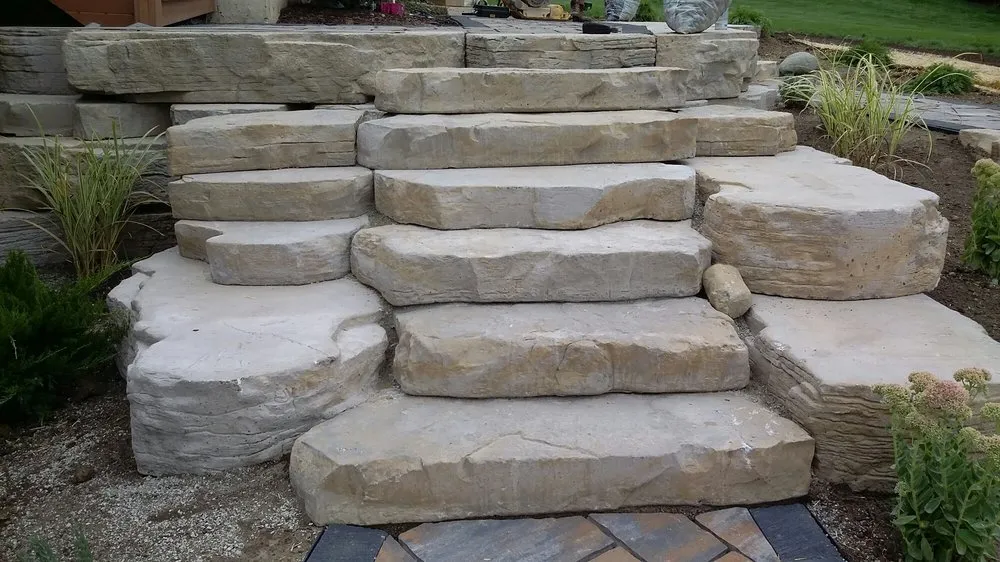 Custom landscape design for year-round maintenance across Lansing, MI - Estrada Services