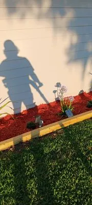 Ethans Home Improvments And Lawn Service Logo