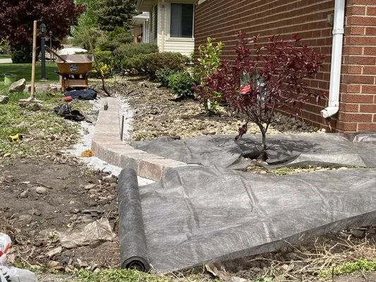 Ethan's Landscaping & Brickpaving Logo