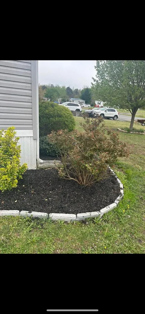 Custom garden landscaping for year-round maintenance in Felton, DE by Ets Lawncare and More
