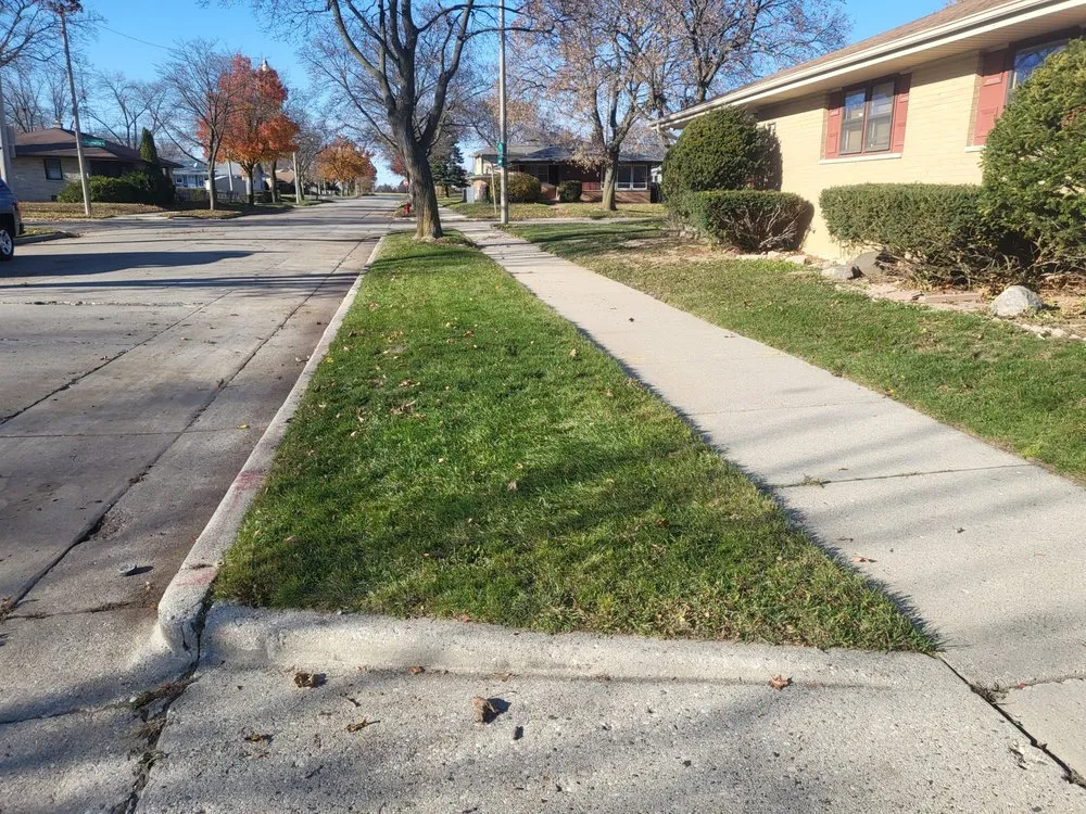 Trusted lawn mowing service with custom design in Milwaukee, WI by Evans Lawn Care & Snow Removal