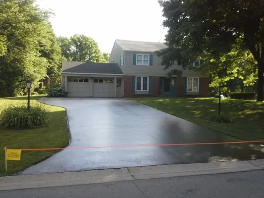 Evans Sealcoating & Property Maintenance Logo