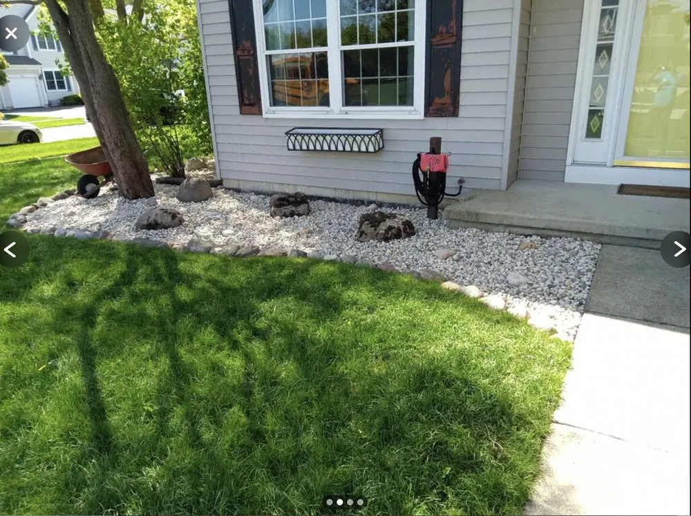 Expert lawn mowing service for homes across Waukegan, IL - Evelyn & Natte's Hardscapes