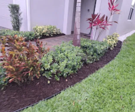 Custom lawn mowing service with custom design in Davie, FL by Everglades Lawn and Landscaping
