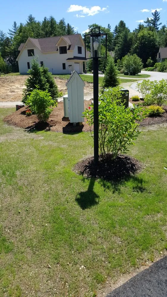 Trusted lawn mowing service for year-round maintenance in Campton, NH by Evergreen Acres