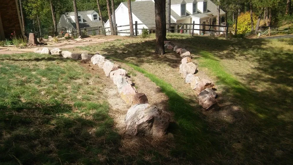 Professional yard maintenance for year-round maintenance in Colorado Springs, CO by Evergreen Ecoscape and Design