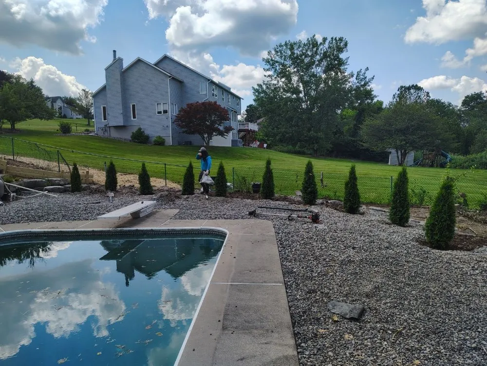Custom yard cleanup service in East Syracuse, NY by Evergreen landscaping