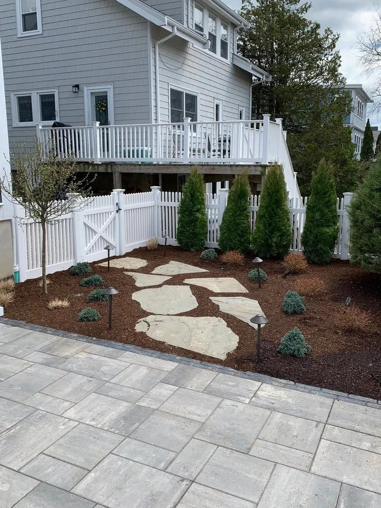 Local yard cleanup service with custom design in Easton, MA by Evergreen Landscaping