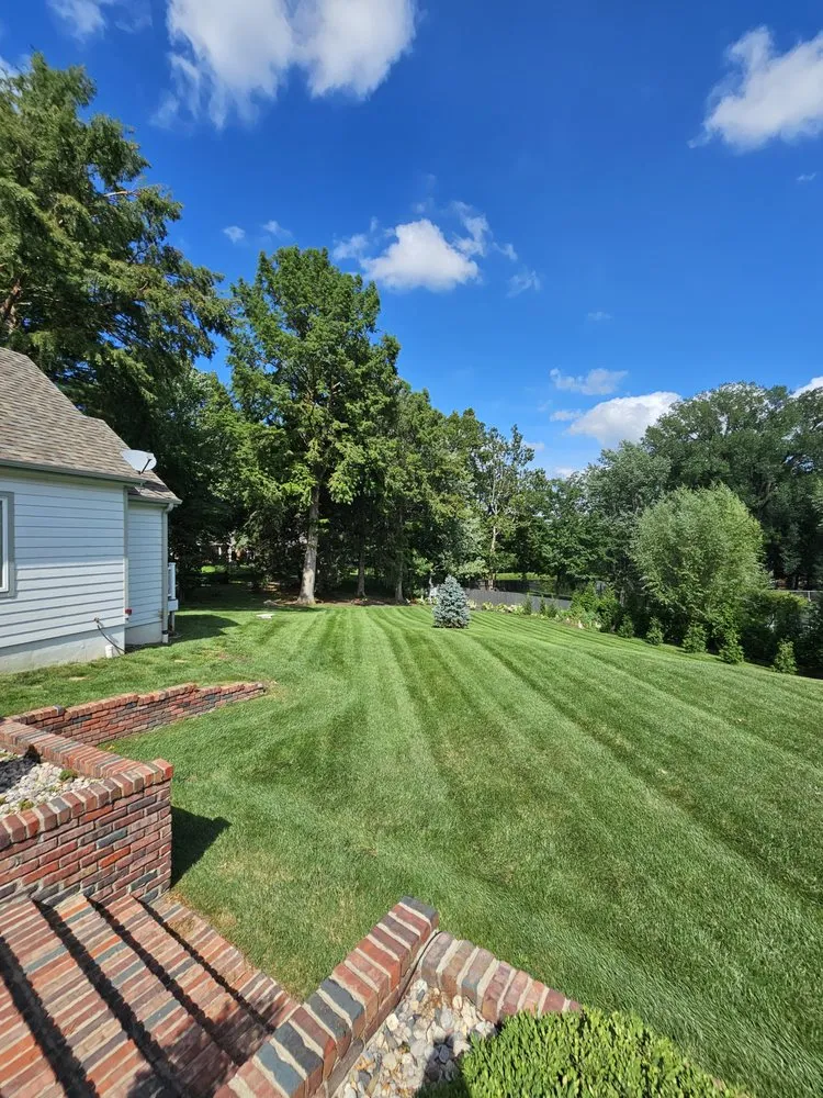 Professional yard maintenance with custom design in St. Joseph, MO by Evergreen Lawn & Property